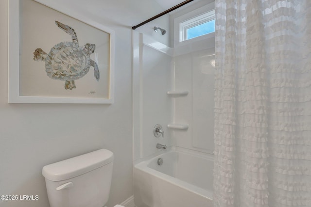 full bathroom with toilet and shower / tub combo with curtain