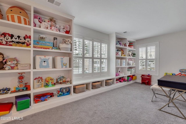 playroom featuring carpet and visible vents