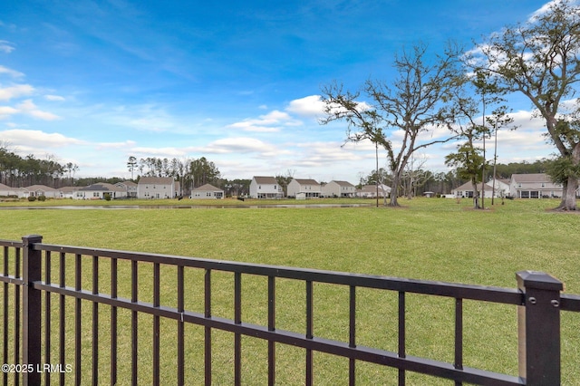 view of yard featuring a residential view