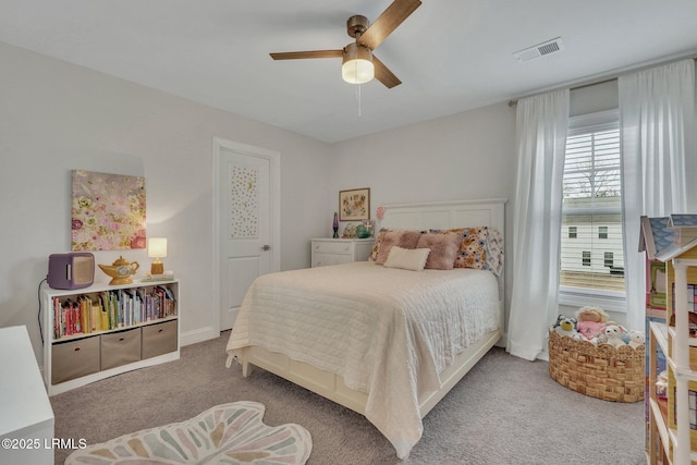 bedroom with ceiling fan, carpet floors, and visible vents