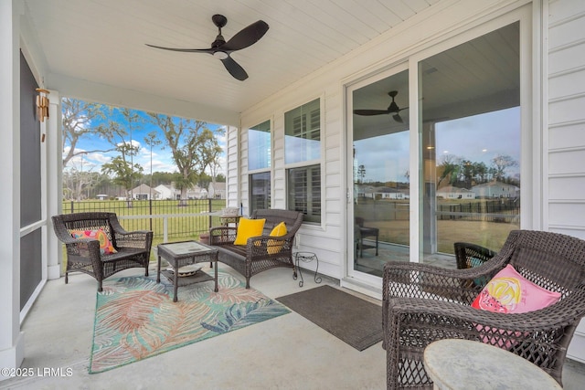 view of patio / terrace featuring ceiling fan and outdoor lounge area