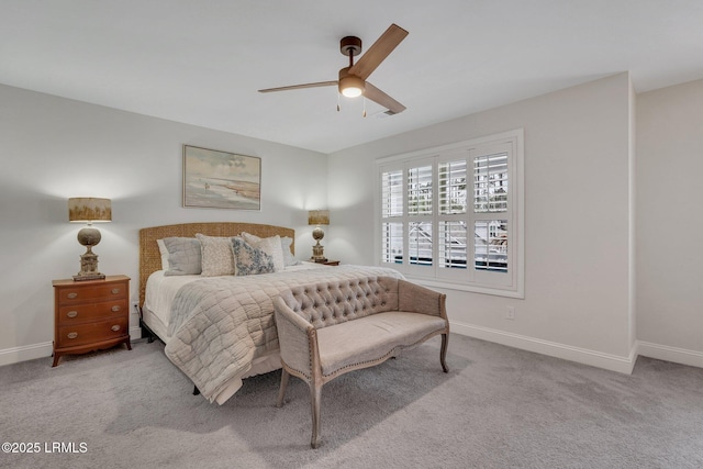 bedroom with carpet, baseboards, and a ceiling fan