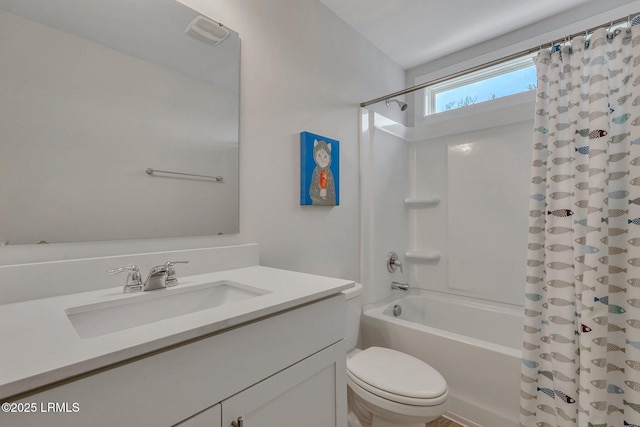 bathroom with visible vents, vanity, shower / bath combination with curtain, and toilet