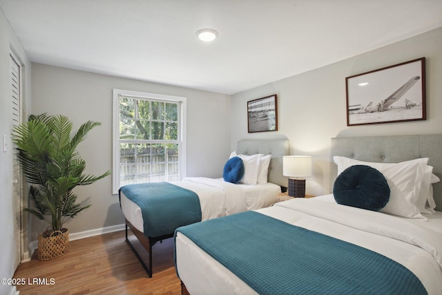 2503 Twin Oaks Ln, Port Royal, SC 29935 - bedroom featuring wood finished floors and baseboards