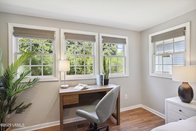 2503 Twin Oaks Ln, Port Royal, SC 29935 - office area with baseboards and wood finished floors