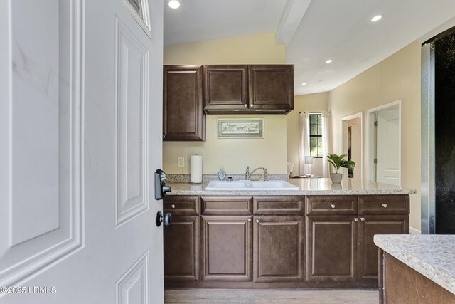 2503 Twin Oaks Ln, Port Royal, SC 29935 - kitchen with a sink, dark brown cabinetry, recessed lighting, and a peninsula