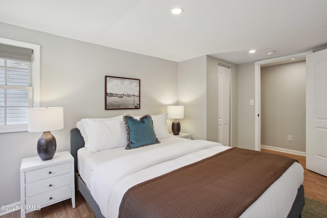 2503 Twin Oaks Ln, Port Royal, SC 29935 - bedroom featuring wood finished floors, baseboards, recessed lighting, and a closet