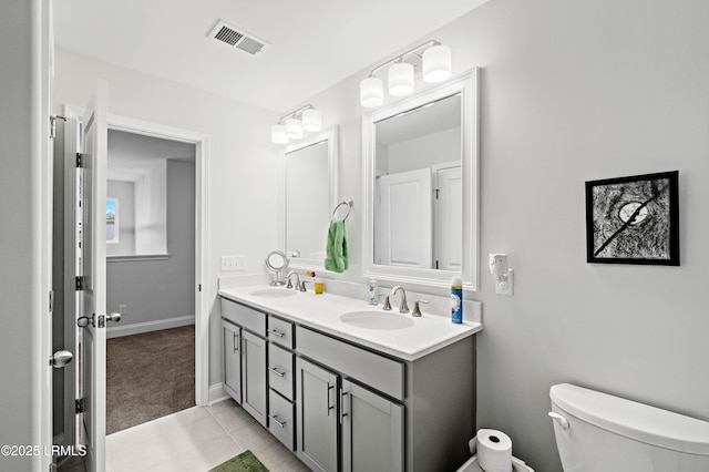 400 Ramport St, Ridgeland, SC 29936 - bathroom with double vanity, toilet, visible vents, and a sink