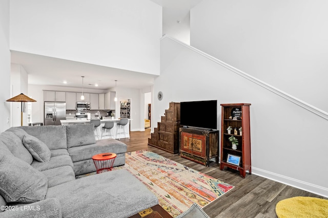 400 Ramport St, Ridgeland, SC 29936 - living area featuring recessed lighting, baseboards, dark wood finished floors, and a towering ceiling