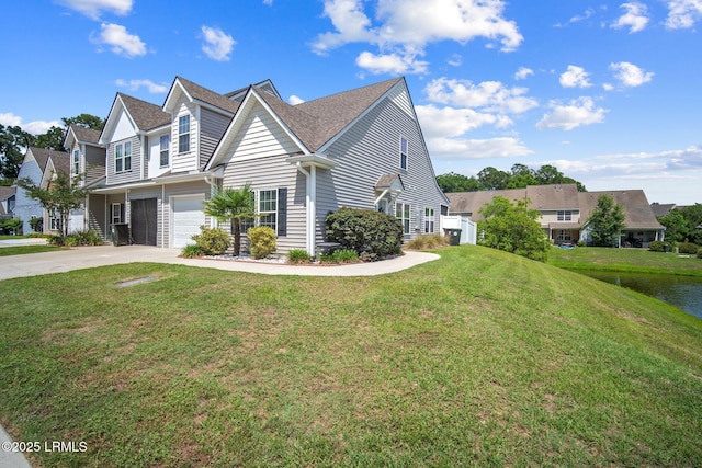 360 Dante Cir, Beaufort, SC 29906 - view of front of house featuring concrete driveway, a front yard, and an attached garage