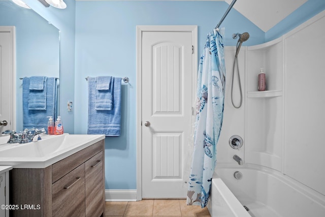 bathroom with shower / bath combo, vanity, and tile patterned floors