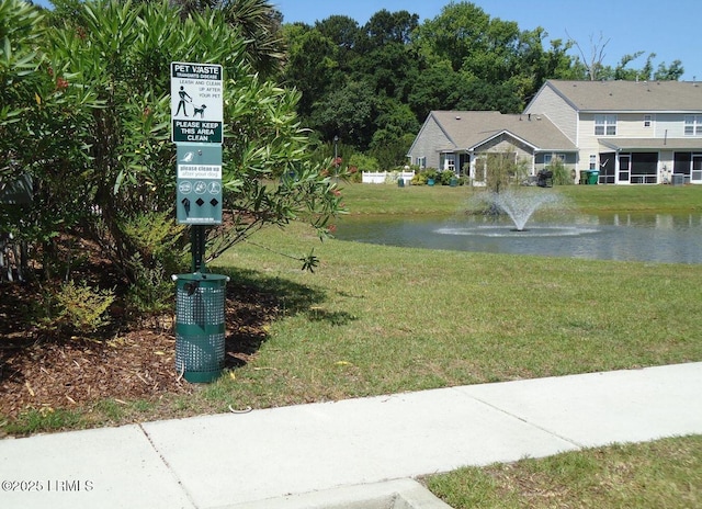 view of yard featuring a water view