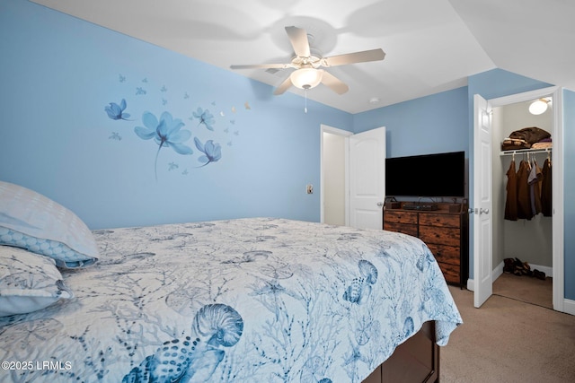 bedroom featuring baseboards, a closet, a ceiling fan, and light colored carpet