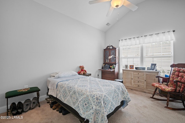 bedroom featuring baseboards, visible vents, a ceiling fan, light colored carpet, and high vaulted ceiling