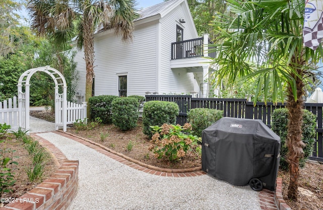 view of property exterior featuring a balcony