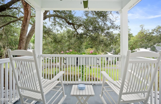 wooden deck with a yard