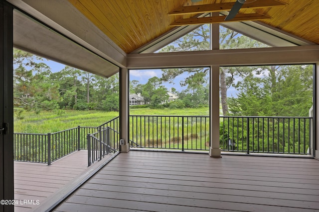 wooden terrace featuring ceiling fan