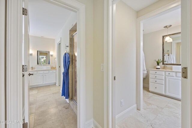 hallway featuring sink