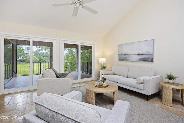 living room with high vaulted ceiling and ceiling fan