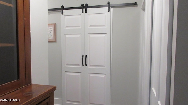 interior details featuring a barn door