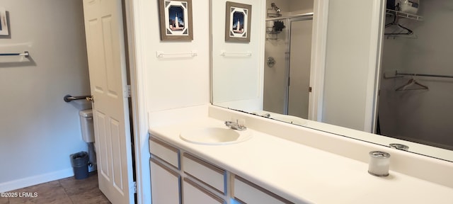 1231 Ladys Island Dr Unit 221, Port Royal, SC 29935 - full bathroom with vanity, a shower with shower door, a walk in closet, and tile patterned flooring