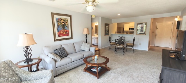 1231 Ladys Island Dr Unit 221, Port Royal, SC 29935 - carpeted living area with ceiling fan and baseboards