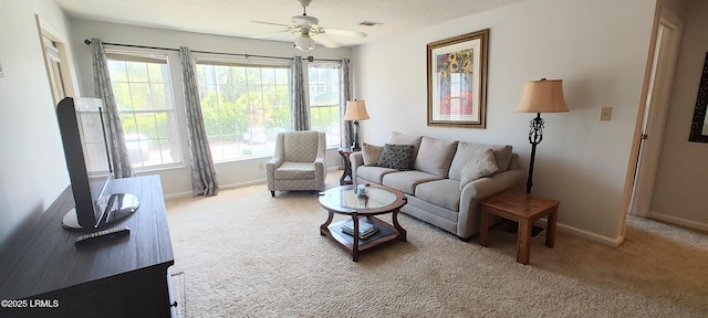 1231 Ladys Island Dr Unit 221, Port Royal, SC 29935 - living area with carpet floors, a ceiling fan, and a textured ceiling