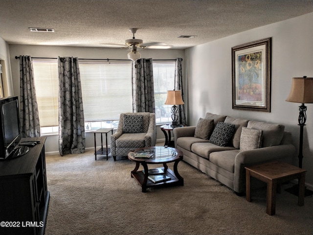 1231 Ladys Island Dr Unit 221, Port Royal, SC 29935 - living area featuring carpet flooring, a textured ceiling, ceiling fan, and visible vents