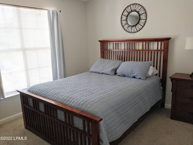 1231 Ladys Island Dr Unit 221, Port Royal, SC 29935 - bedroom featuring baseboards and carpet