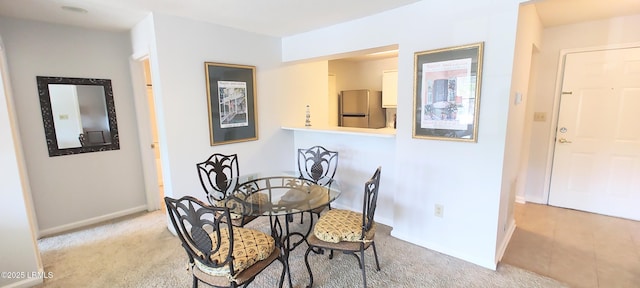 1231 Ladys Island Dr Unit 221, Port Royal, SC 29935 - dining room with carpet and baseboards