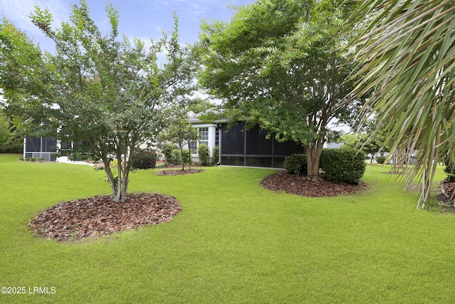 6 Callisto Rd, Okatie, SC 29909 - view of green lawn featuring a sunroom