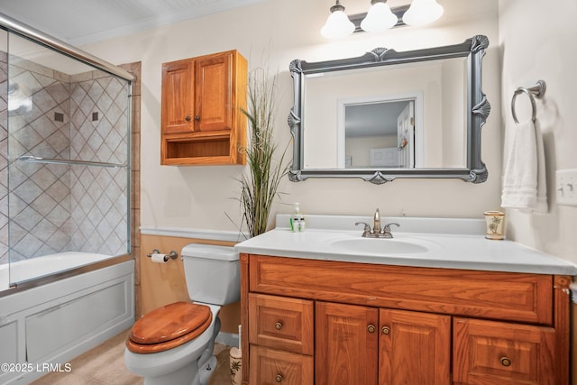 373 Pike Dr, Fripp Island, SC 29920 - full bathroom featuring vanity, enclosed tub / shower combo, tile patterned flooring, and wainscoting