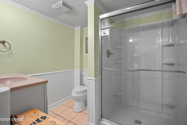 373 Pike Dr, Fripp Island, SC 29920 - full bath featuring crown molding, a stall shower, vanity, wainscoting, and tile patterned floors