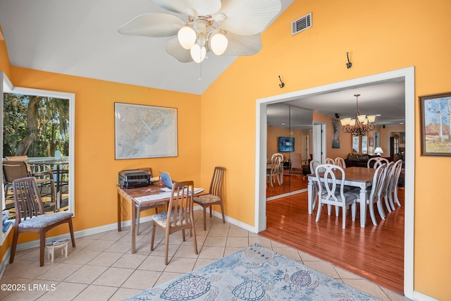 373 Pike Dr, Fripp Island, SC 29920 - dining room with lofted ceiling, a chandelier, light tile patterned flooring, ceiling fan, and an office area