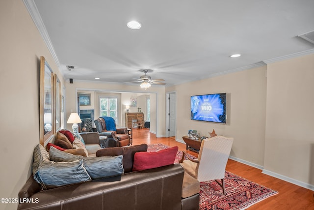 373 Pike Dr, Fripp Island, SC 29920 - living room with crown molding, light wood finished floors, recessed lighting, and a ceiling fan