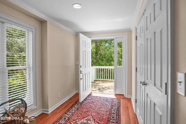 373 Pike Dr, Fripp Island, SC 29920 - foyer entrance with plenty of natural light, ornamental molding, light wood-style flooring, and recessed lighting