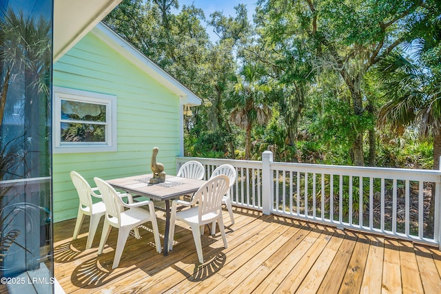 373 Pike Dr, Fripp Island, SC 29920 - wooden deck featuring outdoor dining area
