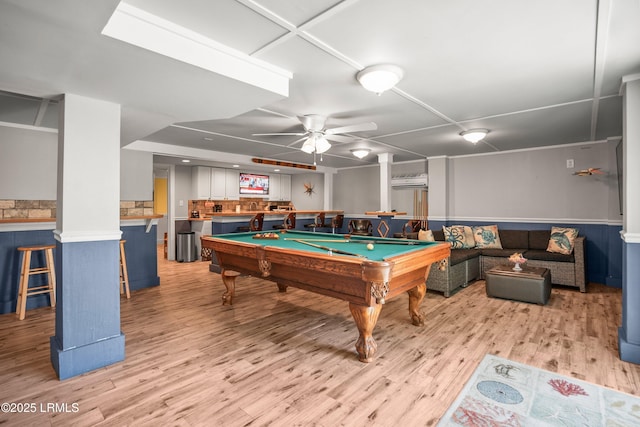 373 Pike Dr, Fripp Island, SC 29920 - recreation room with light wood-style floors, a wainscoted wall, a ceiling fan, and billiards