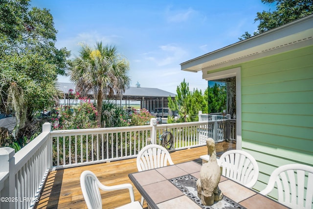 373 Pike Dr, Fripp Island, SC 29920 - wooden terrace featuring outdoor dining space
