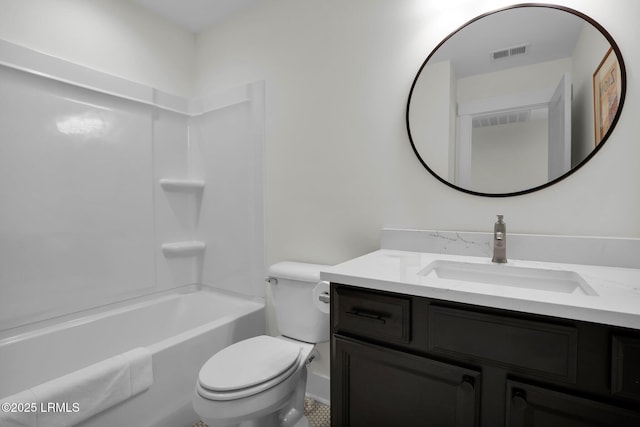 bathroom with visible vents, toilet, vanity, and shower / tub combination
