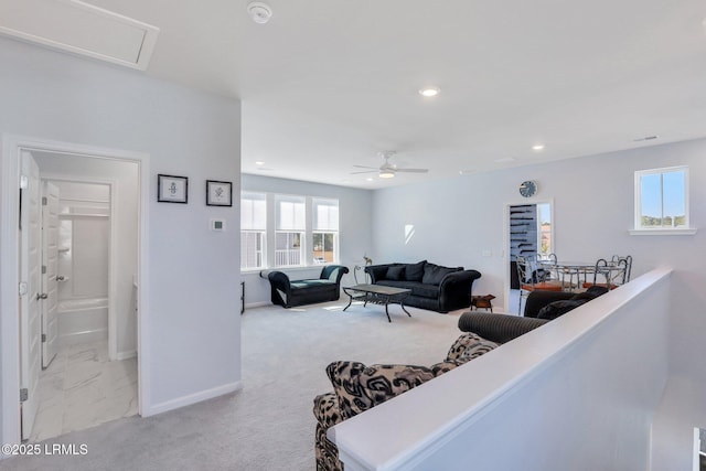 carpeted living area featuring marble finish floor, recessed lighting, visible vents, ceiling fan, and baseboards