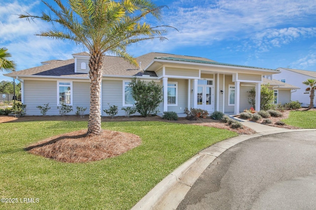 view of front of home featuring a front yard