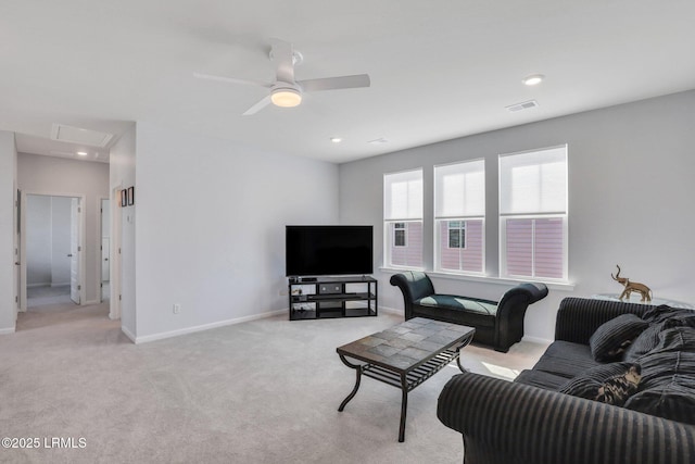 living area featuring recessed lighting, carpet flooring, visible vents, baseboards, and attic access