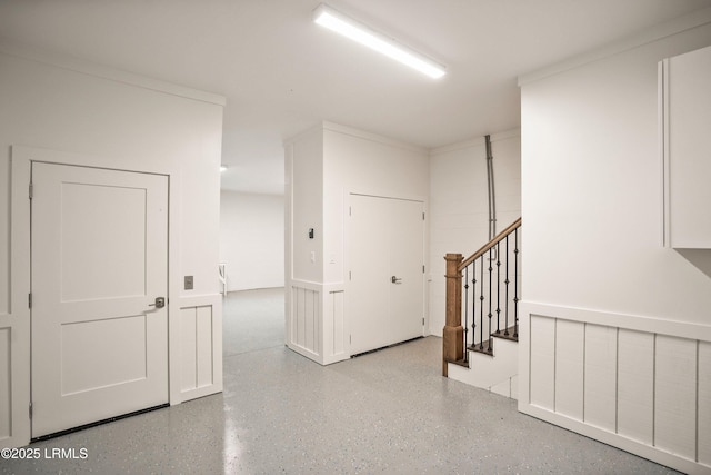 bathroom featuring vanity, crown molding, and walk in shower