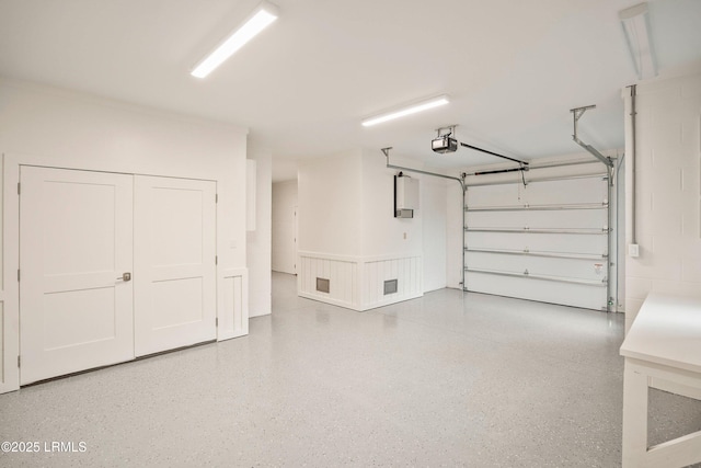 interior space with hardwood / wood-style flooring and ornamental molding