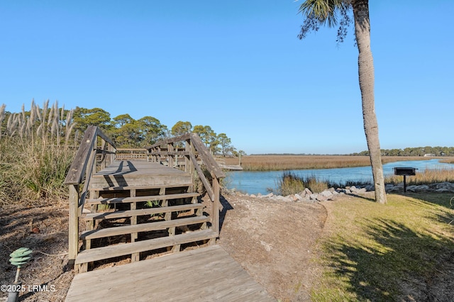 dock area featuring a water view