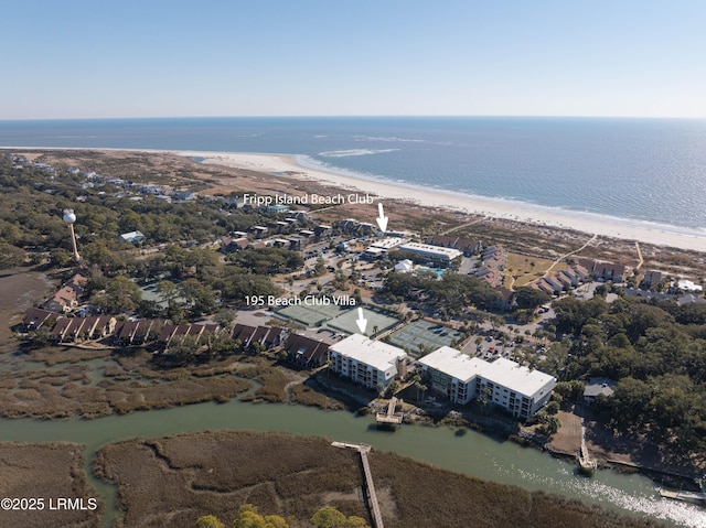 aerial view with a water view and a view of the beach