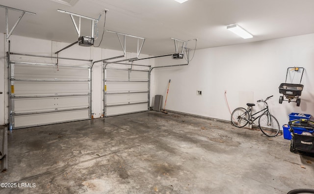 garage featuring a garage door opener