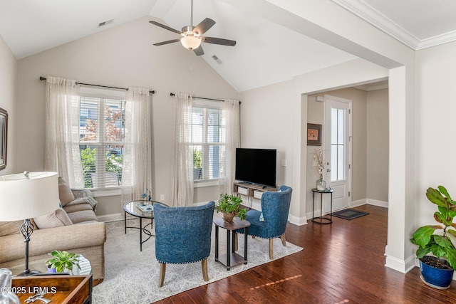 living area featuring lofted ceiling, visible vents, a ceiling fan, and wood finished floors