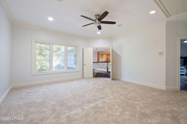 unfurnished living room featuring attic access, baseboards, crown molding, carpet flooring, and recessed lighting